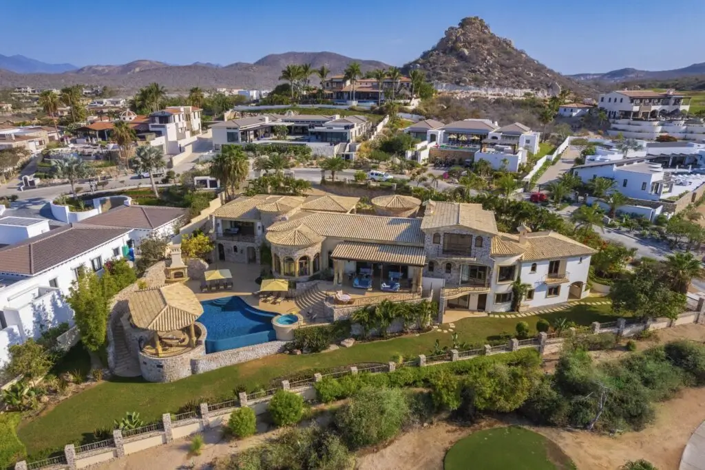 Beachfront Homes for Sale in Cabo San Lucas in Pedregal featuring elevated Pacific Ocean and marina views